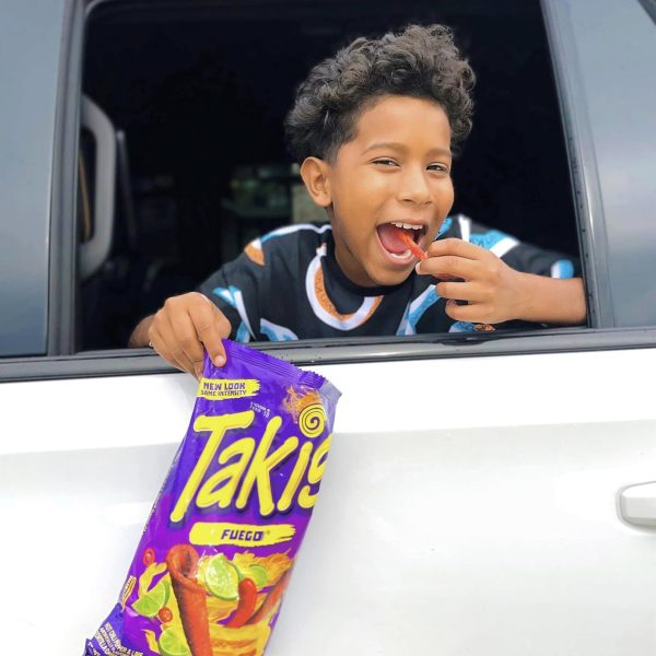 kmarion eating takis in car